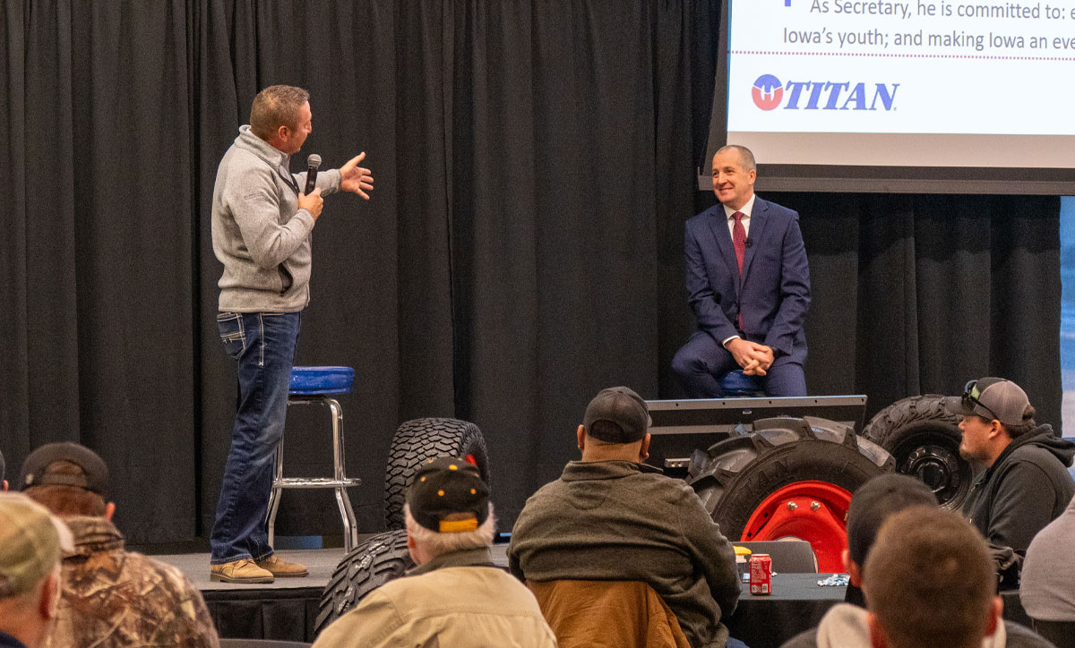 Iowa Secretary of Agriculture, Mike Naig, shares the stage with Scott Sloan at the 2025 Titan University Summit