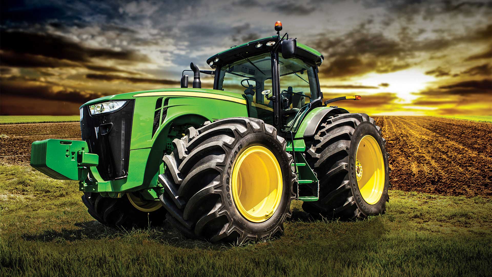 John Deere tractor equipped with the perfect LSW tire to reduce pinch row soil compaction